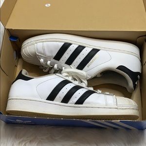 Black stripped original adidas shoe